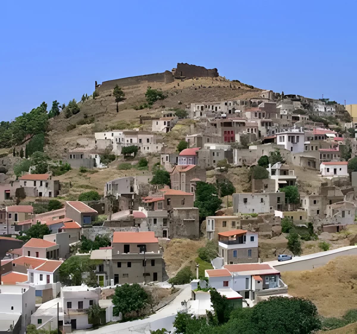 Volissos village in northwest Chios with castle and coastal views