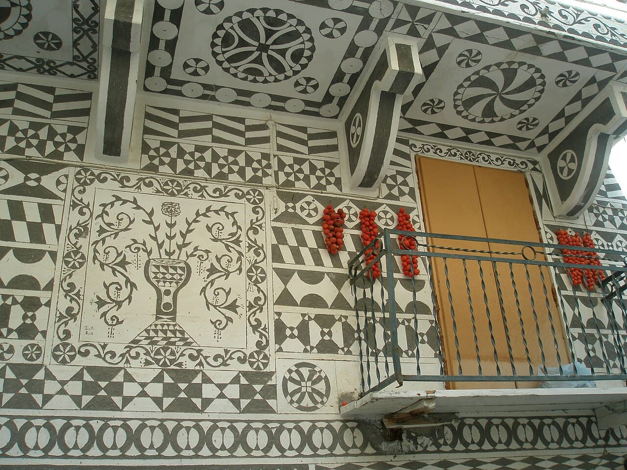 Pyrgi village in Chios with black and white geometric house decorations